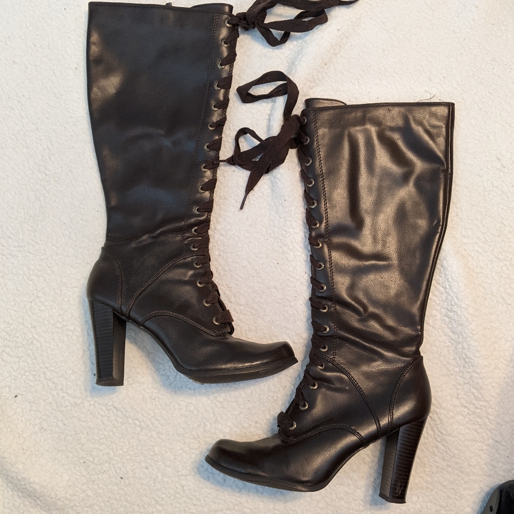 Knee high laced up boots with side zipper